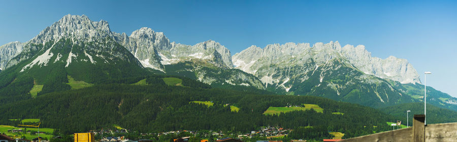 Panoramic view of trees and mountains against clear sky on the wilder kaiser area in austria