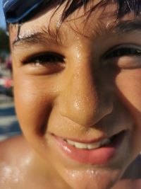 Close-up portrait of smiling boy