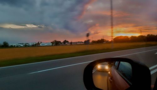 Close-up of car on side-view mirror