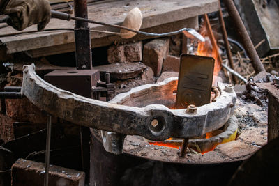 High angle view of rusty machine part