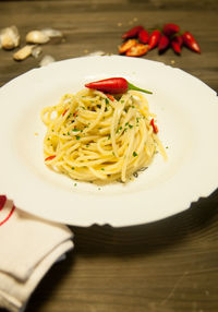 Close-up of noodles in plate on table