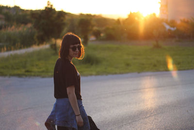 Young woman on road