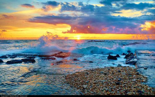 Scenic view of sea against sky during sunset