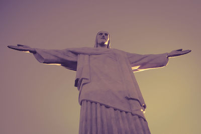 Low angle view of statue against sky