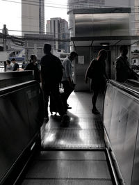 People walking in modern office building