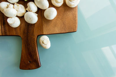 High angle view of cutting board on table