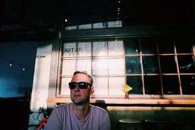 Portrait of young man wearing sunglasses