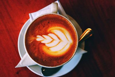 High angle view of cappuccino on table