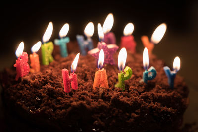 Close-up of candles on cake