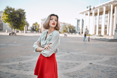 Young woman standing outdoors