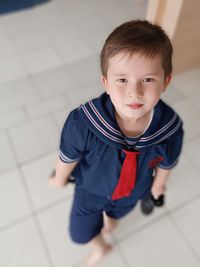 High angle portrait of cute boy wearing uniform