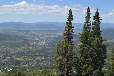 Scenic view of mountains against cloudy sky