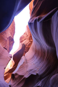 Close-up of rock formation against sky