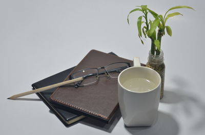 Close-up of coffee cup on table