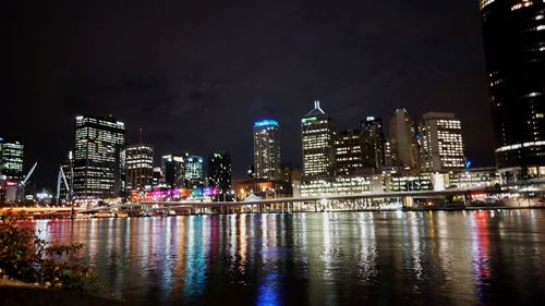 Illuminated city lit up at night