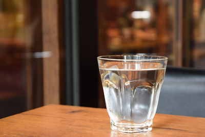 Close-up of beer in glass on table