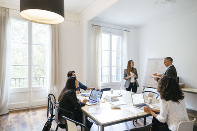 Business people having a team meeting in office