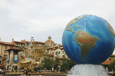 Statue of liberty against building