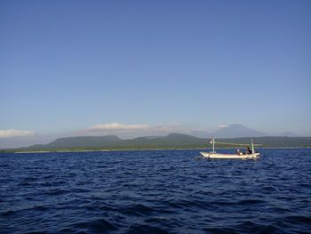 Boat sailing in sea