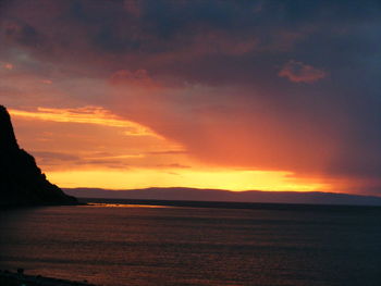 Scenic view of dramatic sky during sunset