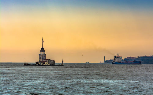 Scenic view of sea against sky during sunset