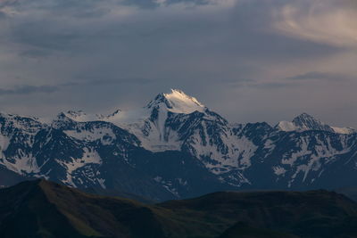 Scenic view of snowcapped mountains against sky during winter. mount diklosmta in the caucasus. 