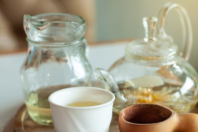 Close-up of tea in jar on table