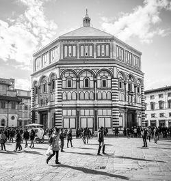 People in front of building