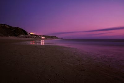 View of calm sea at dusk