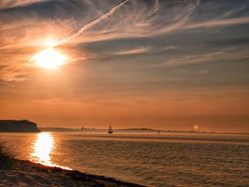 Scenic view of sea against sky during sunset