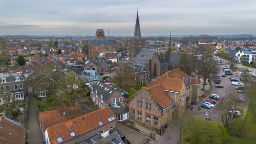 Beautiful view from above, from drone to orange, tiled roofs of houses. city of wijk bij duurstede. 