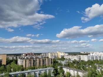 Buildings in city against sky