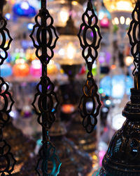 Close-up of illuminated lighting equipment for sale in market