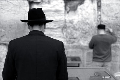 Rear view of man wearing hat