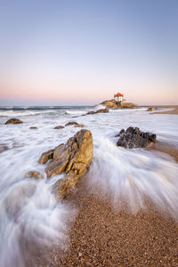 Scenic view of sea against clear sky