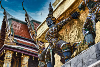 Low angle view of statues on building