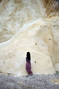 Low section of woman on beach