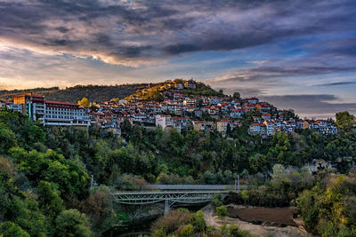 High angle view of townscape against cloudy sky