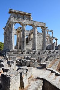 Low angle view of old ruins against clear sky