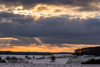 Scenic view of dramatic sky during sunset