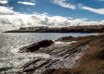 Scenic view of beach against sky