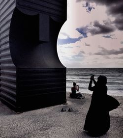 Woman standing on beach