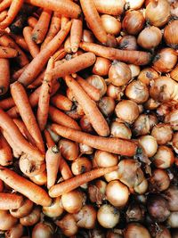 Full frame shot of carrots and onions