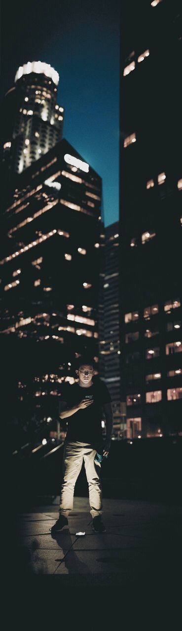 illuminated, architecture, building exterior, built structure, real people, night, one person, outdoors, people, sky, adults only, adult