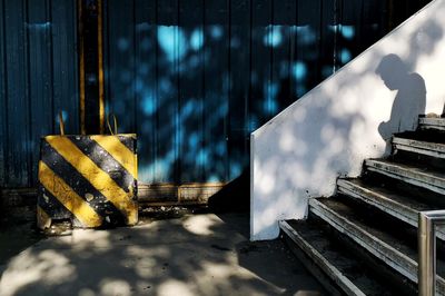 High angle view of metal railing on staircase