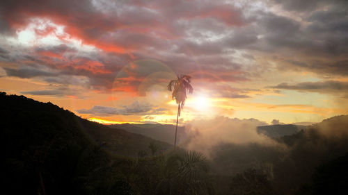 Scenic view of mountains against sky during sunset