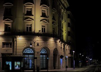 Low angle view of illuminated building at night