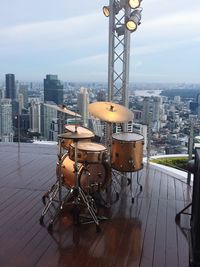 Drum set against cityscape