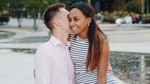 Young couple kissing outdoors