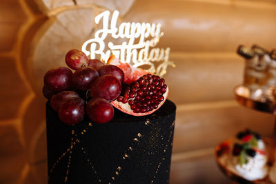 Close-up of cherries on table